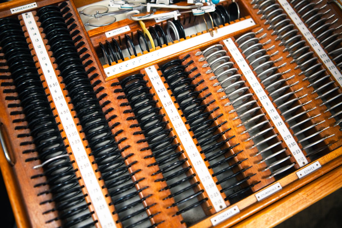 Professional optical lens testing kit with precision measurement tools at Dipple & Conway