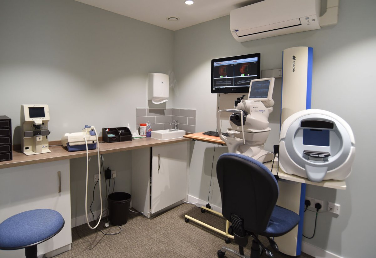 State-of-the-art diagnostic equipment room at Dipple & Conway featuring Optos and OCT scanners