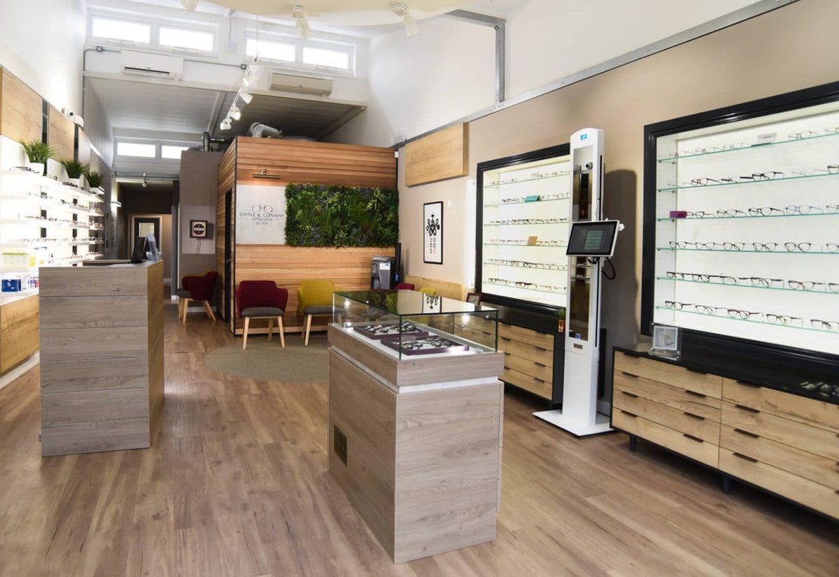 Modern, welcoming interior of Dipple & Conway practice with comfortable seating and eyewear displays